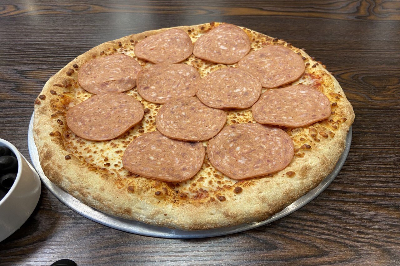 Discover the Savory Flavors of Pizza Restobar's Halal Pepperoni Pizza